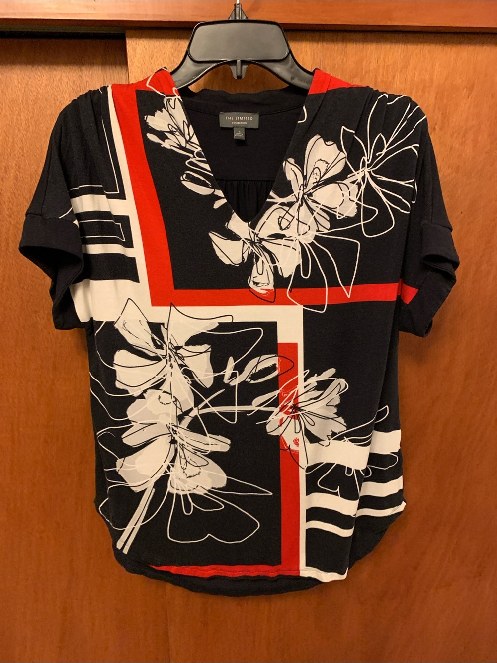 The Limited Black Floral Geometric V-Neck Top with Red & White Accents